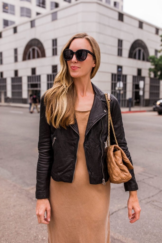 Black Leather Biker Jacket With Tan Knit Dress, Close-Up Take Black Leather Biker Jacket With Tan Knit Dress, Close-Up Take — Biker Leather Jacket Outfits 2027