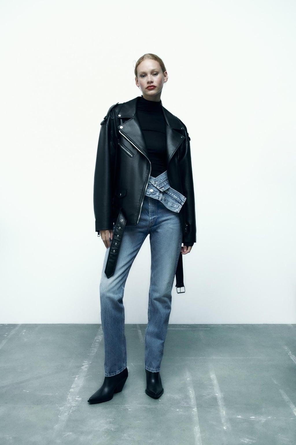 Black Biker Jacket Over Black Turtleneck and Belted Jeans Black Biker Jacket Over Black Turtleneck and Belted Jeans — Biker Leather Jacket Outfits 2027