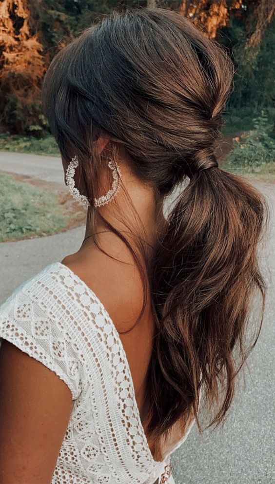 Voluminous Dark Brown Low Ponytail, Mid-Back Voluminous Dark Brown Low Ponytail, Mid-Back — Birthday Ponytail Hairstyles 2027
