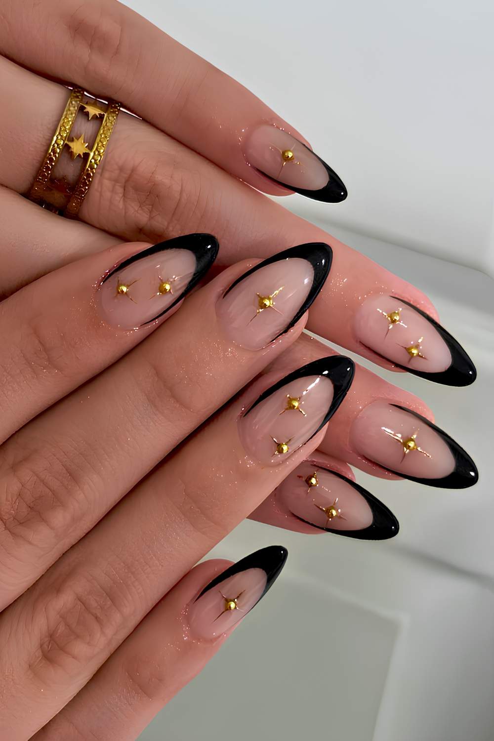 Long Almond Sheer Nude Black French Star Studs Long Almond Sheer Nude Black French Star Studs — Black and Gold Nails 2027