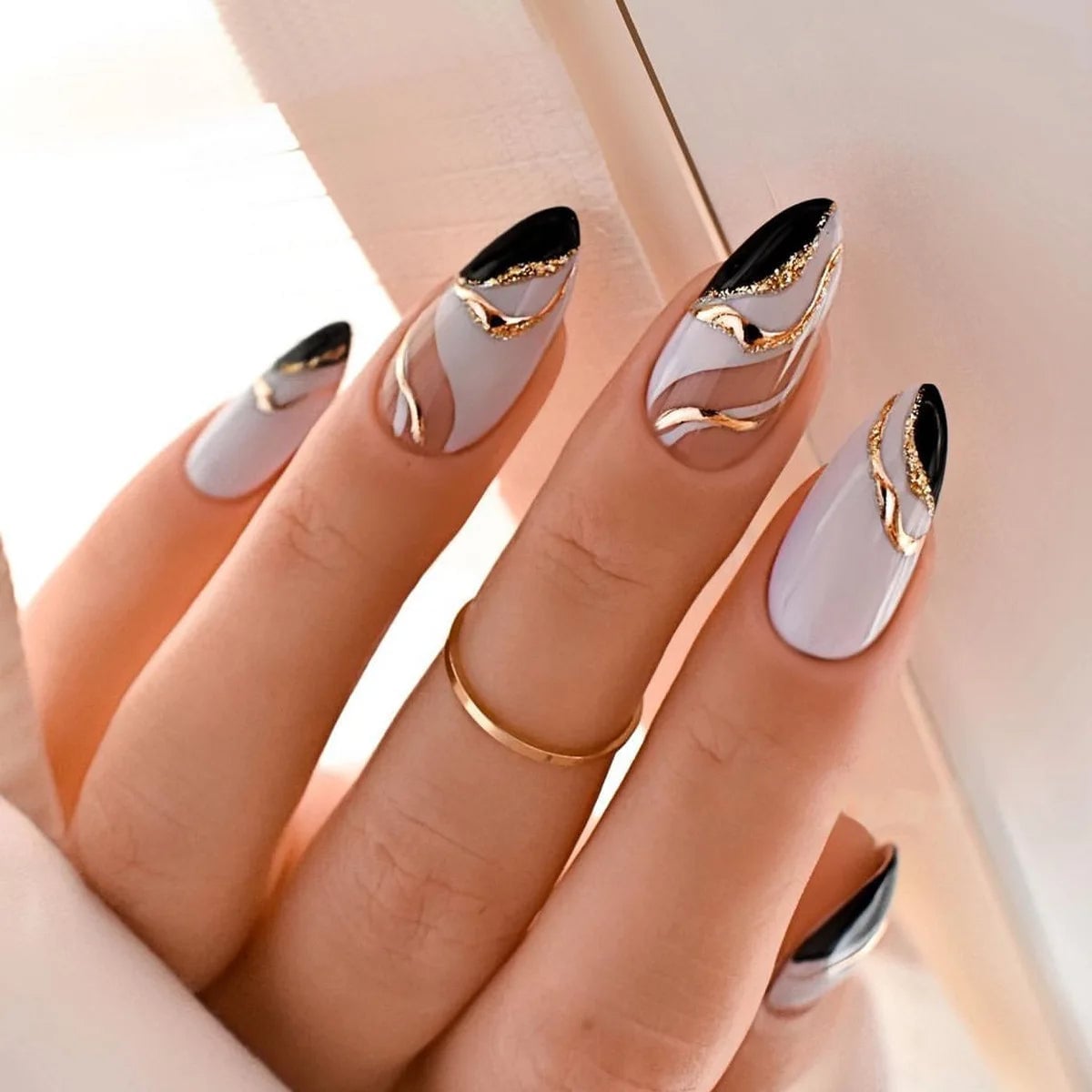Long Almond Black Tips Gold White Wavy Lines Long Almond Black Tips Gold White Wavy Lines — Black and Gold Nails 2027