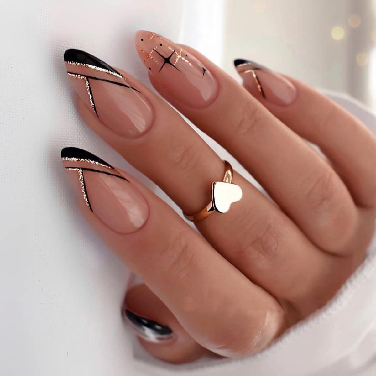 Long Almond Nude Matte Black Tips Gold Accents Long Almond Nude Matte Black Tips Gold Accents — Black and Gold Nails 2027