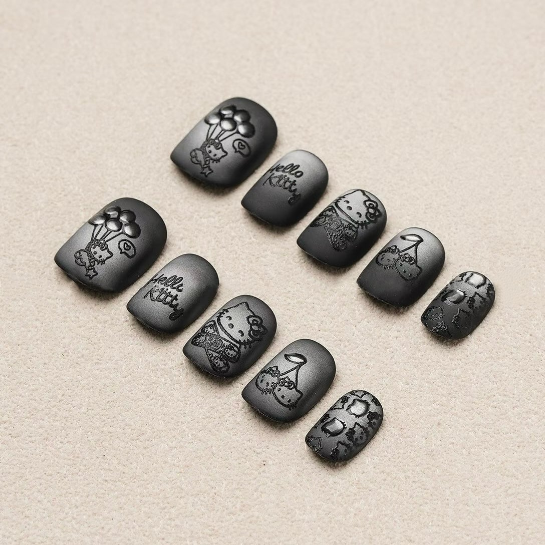 Short Square Matte Black Embossed Hello Kitty Nails Short Square Matte Black Embossed Hello Kitty Nails — Black Hello Kitty Nails 2027