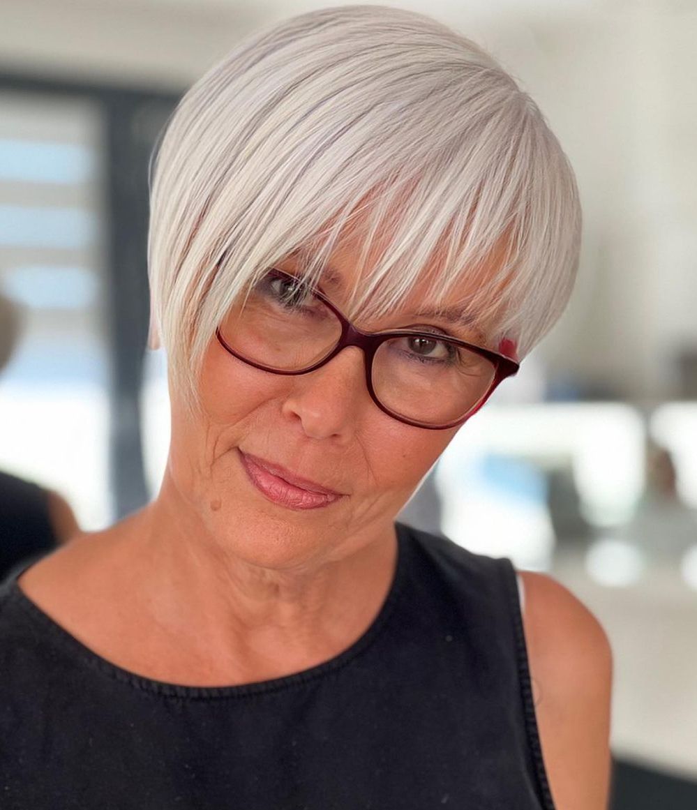 Platinum Blonde Pixie With Long Side-Swept Bangs — Blonde Hair 2027 for Women Over 60
