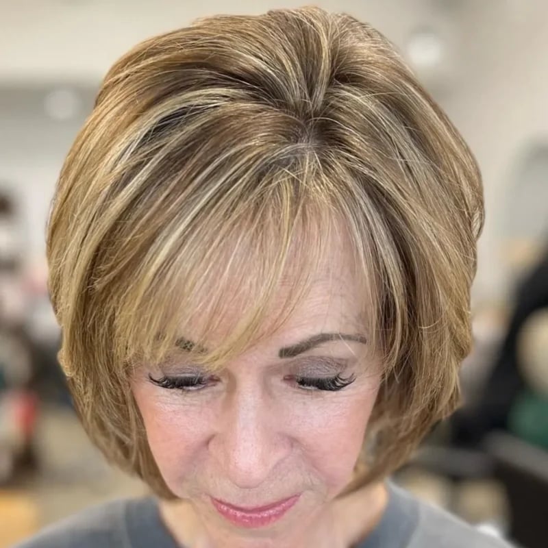 Medium Blonde Chin Layers With Full Fringe — Blonde Hair 2027 for Women Over 60