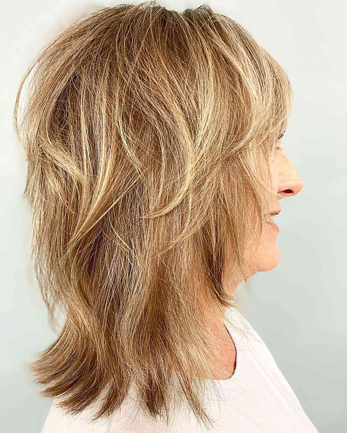 Golden Blonde Collarbone Shag With Textured Layers — Blonde Hair 2027 for Women Over 60