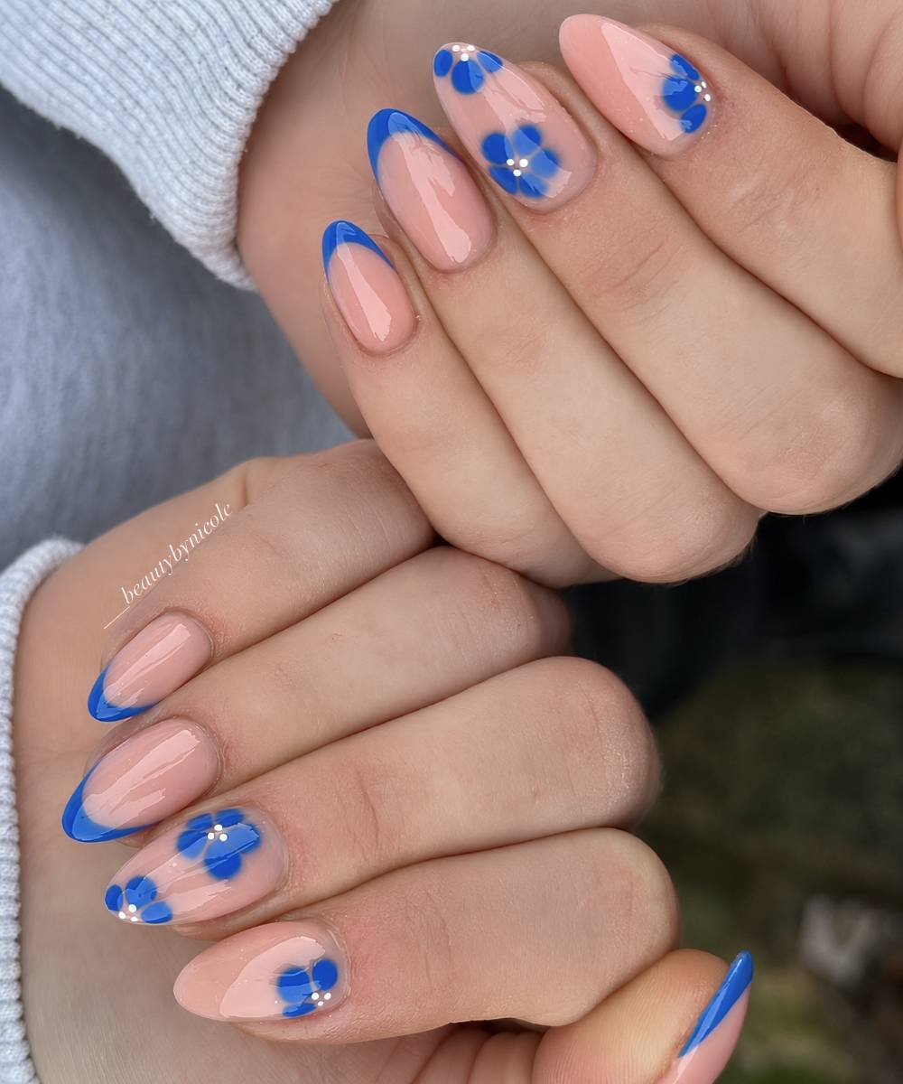 Nude Base Bright Blue French Tips With Flowers, Almond Nude Base Bright Blue French Tips With Flowers, Almond — Blue French Tip Nails 2027
