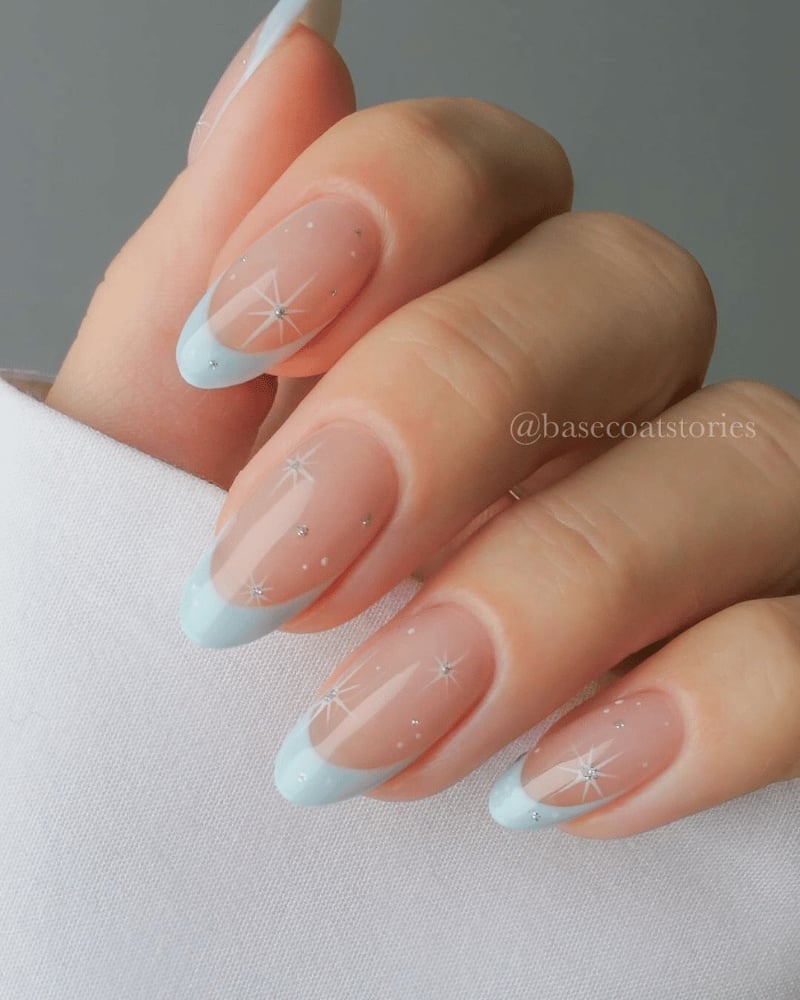 Nude Base Light Blue French Tips With Stars, Almond Nude Base Light Blue French Tips With Stars, Almond — Blue French Tip Nails 2027