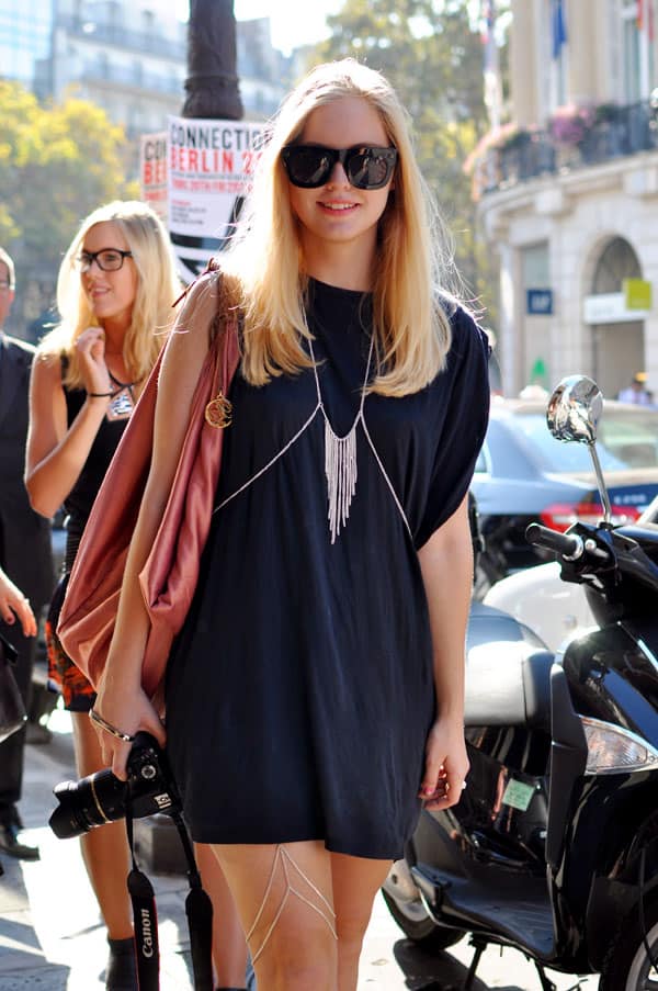 Layered silver body chain with fringe detail on black dress Layered silver body chain with fringe detail on black dress — Body Chain Outfits 2027
