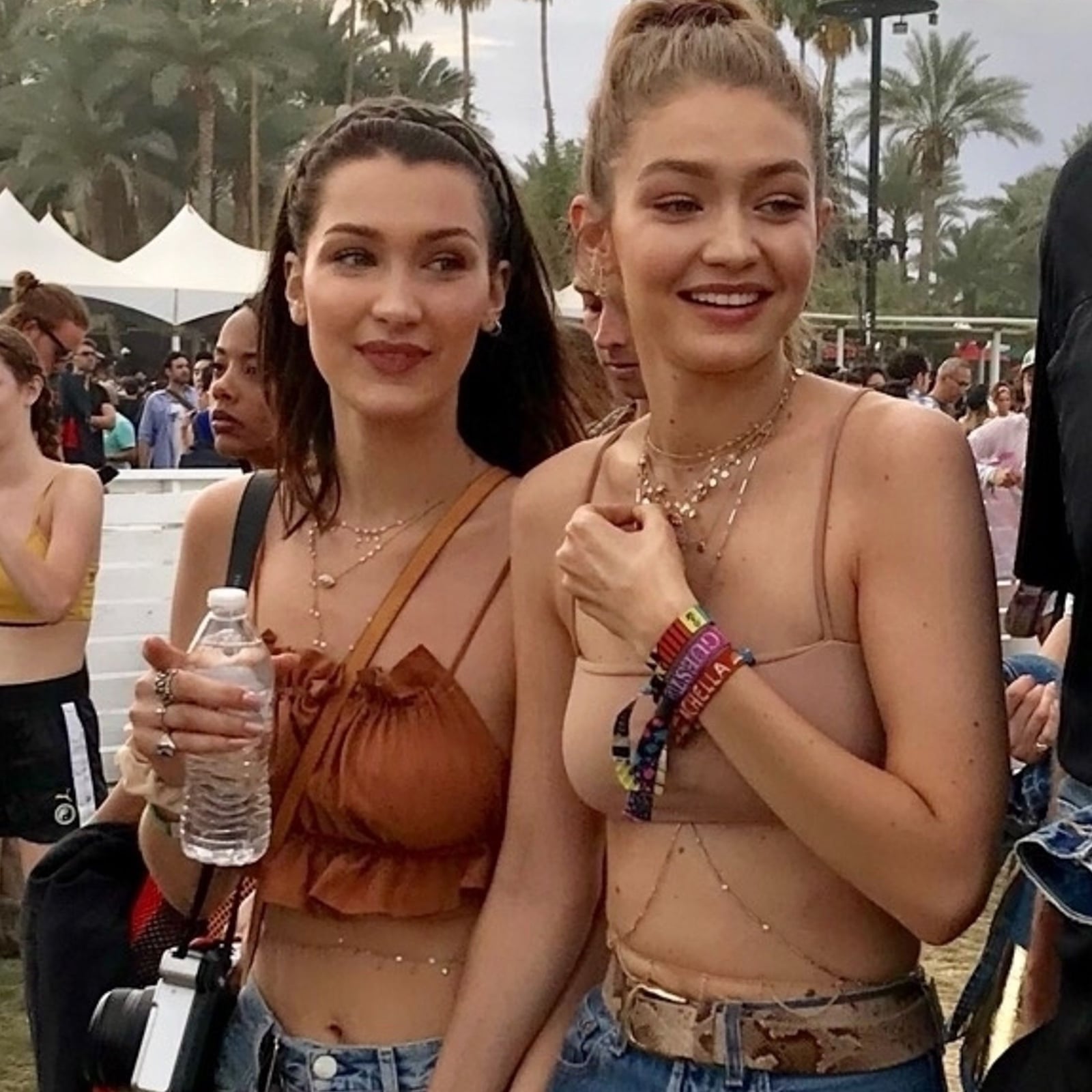Delicate body chains with tank tops and jeans at festival Delicate body chains with tank tops and jeans at festival — Body Chain Outfits 2027