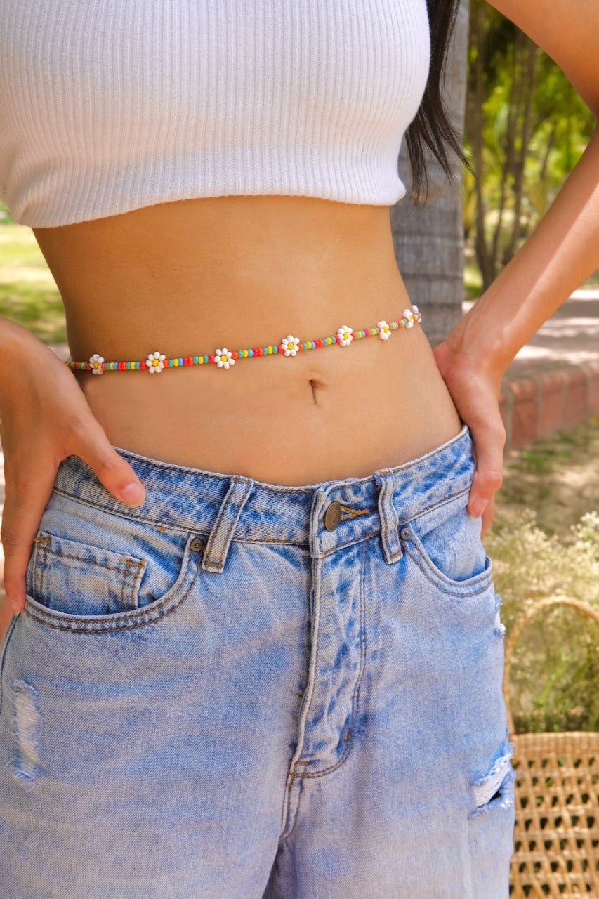 Beaded flower waist chain with white crop top and denim jeans Beaded flower waist chain with white crop top and denim jeans — Body Chain Outfits 2027