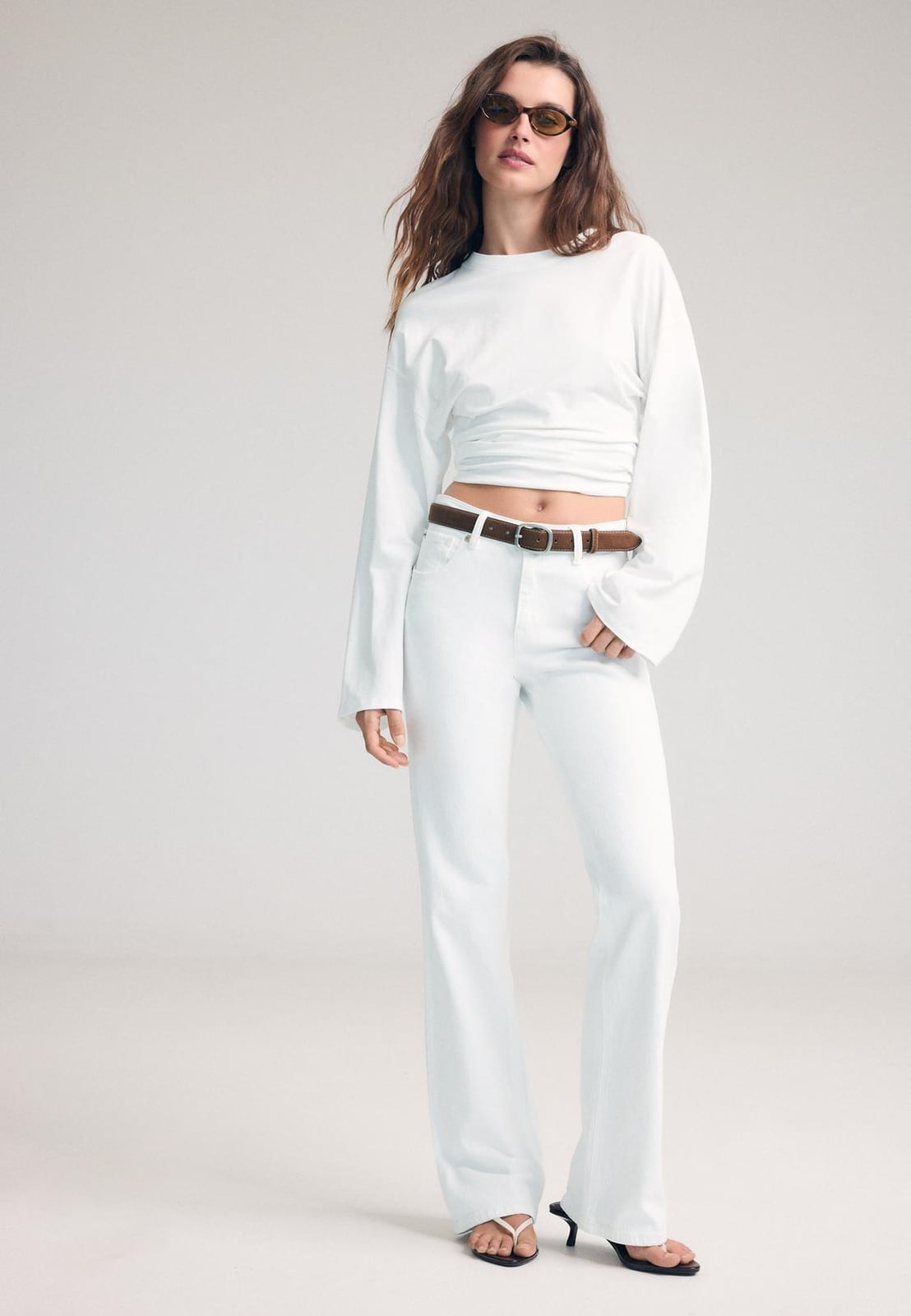 White Wide Leg Jeans With White Wrap Crop Top White Wide Leg Jeans With White Wrap Crop Top — Bootcut Jeans Outfits 2027 with Crop Top