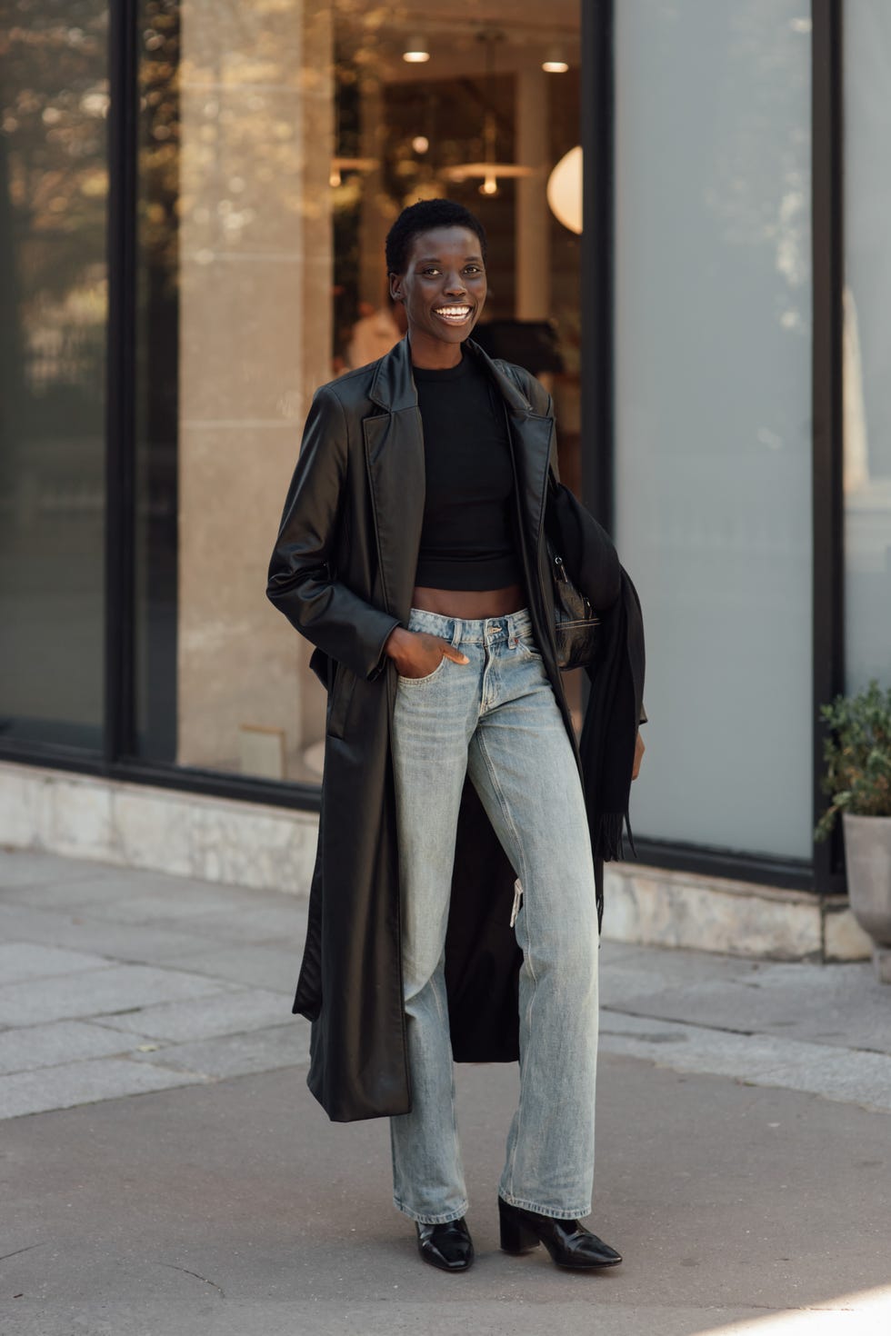 Light Wash Bootcut Jeans With Black Leather Trench Coat Light Wash Bootcut Jeans With Black Leather Trench Coat — Bootcut Jeans Outfits 2027 with Leather Jacket