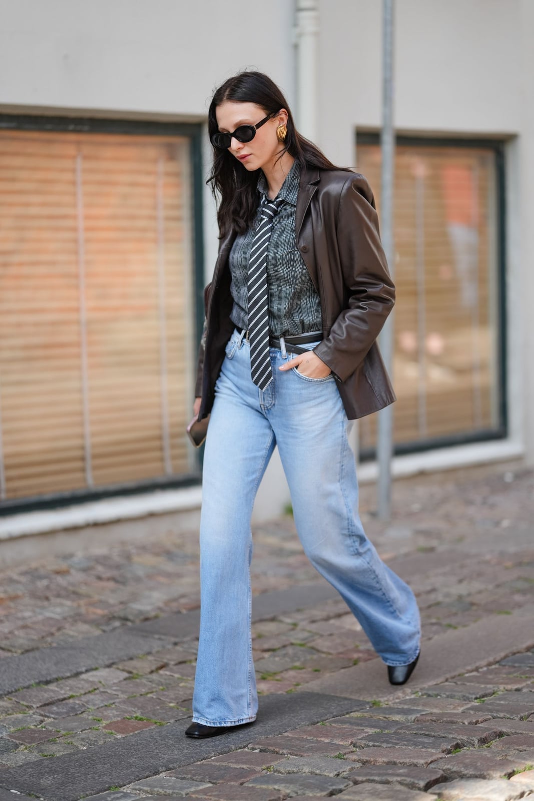 Light Wash Bootcut Jeans With Plaid Shirt Tie And Brown, Close-Up Take Light Wash Bootcut Jeans With Plaid Shirt Tie And Brown, Close-Up Take — Bootcut Jeans Outfits 2027 with Leather Jacket