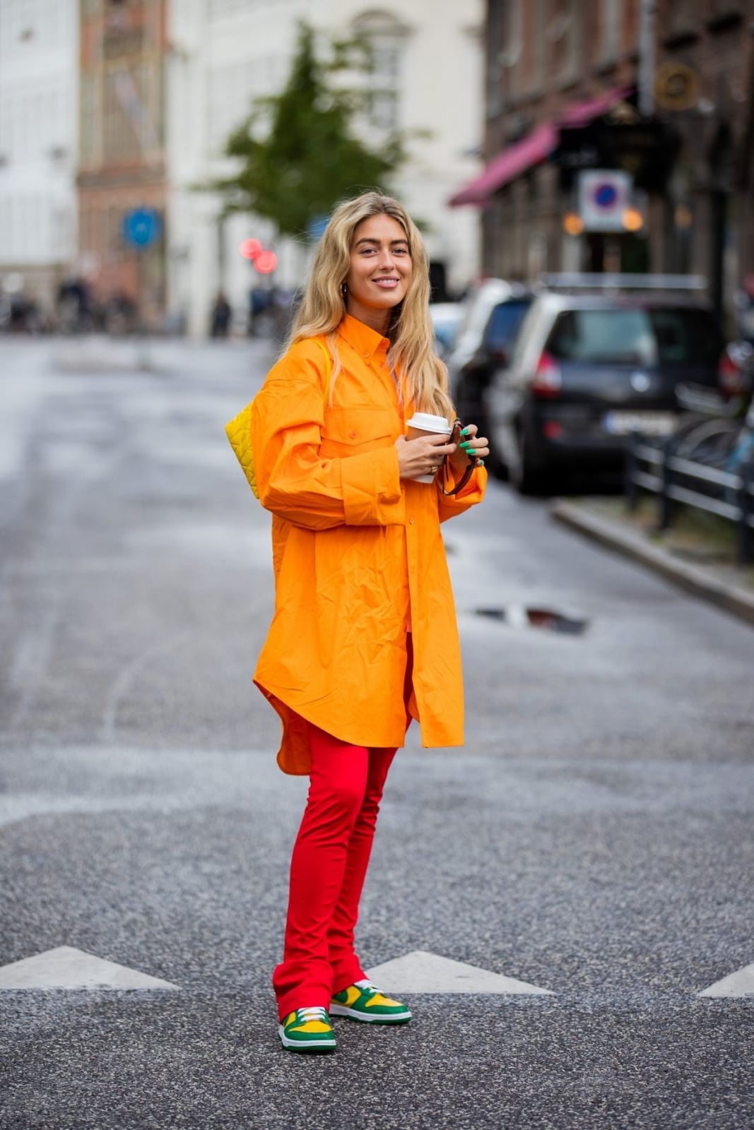 Bright Orange Oversized Shirt Over Red Pants Bright Orange Oversized Shirt Over Red Pants — Bottomless Brunch Outfits 2027