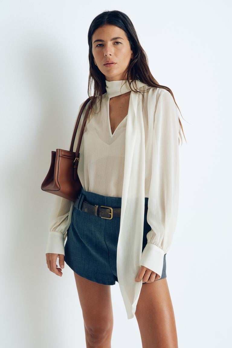 Ivory Sheer Bow Blouse With Blue Shorts Ivory Sheer Bow Blouse With Blue Shorts — Bow Blouse Outfits 2027