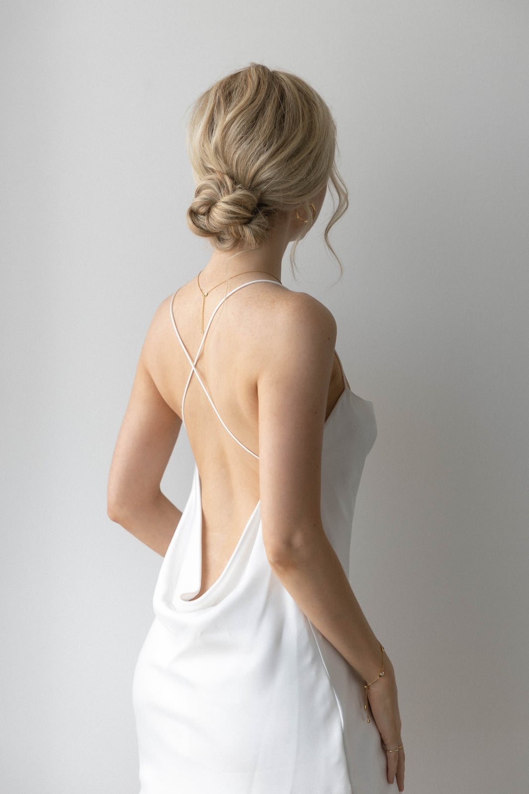 Soft Blonde Low Loose Bun With Wispy Bangs — Braided Low Bun 2027