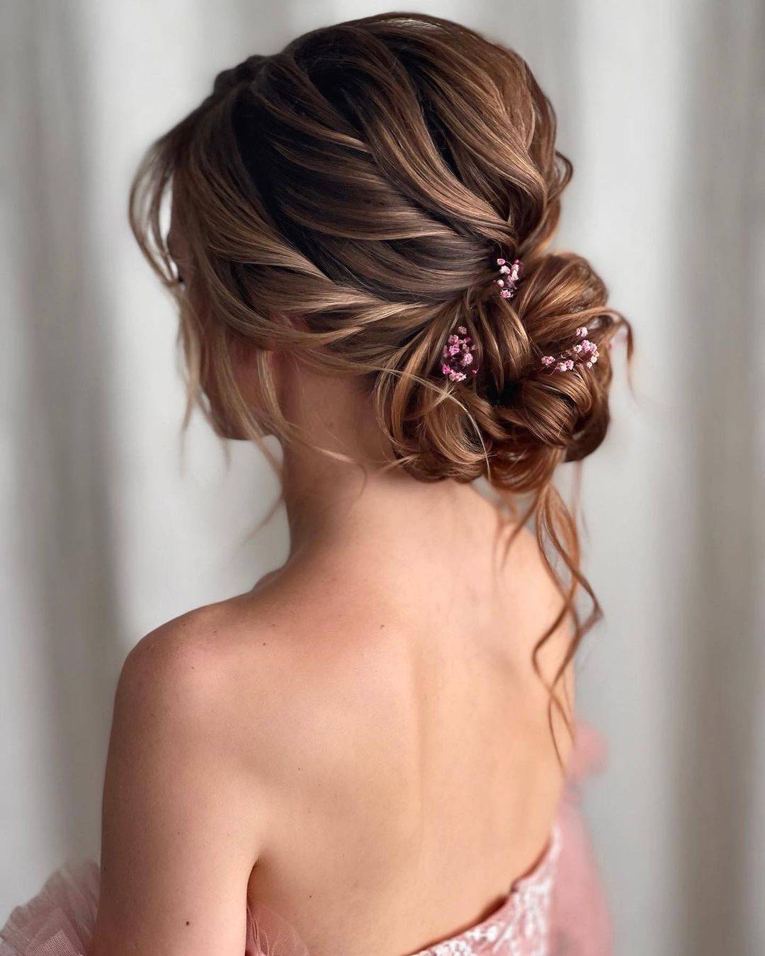Elegant Twisted Low Bun With Braided Accents — Braided Low Bun 2027