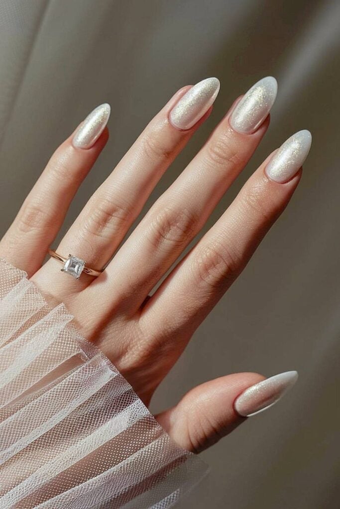 Pale Pearlescent White Medium Almond Nails Pale Pearlescent White Medium Almond Nails — Bridal Shower Nails 2027