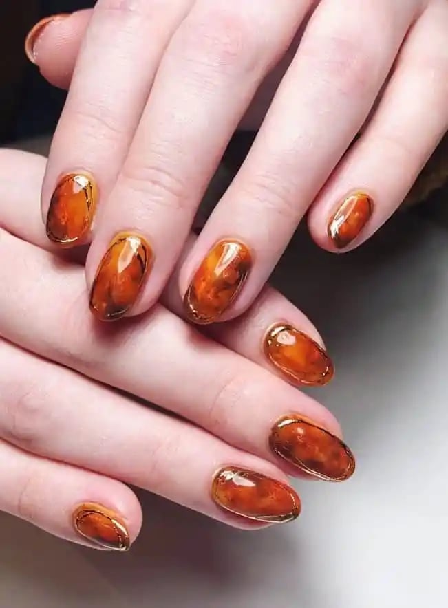 Medium Almond Burnt Orange Cat Eye Nails Medium Almond Burnt Orange Cat Eye Nails — Burnt Orange Nails 2027