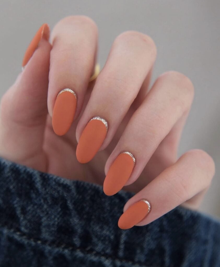 Medium Oval Matte Burnt Orange Glitter Accent Nails Medium Oval Matte Burnt Orange Glitter Accent Nails — Burnt Orange Nails 2027