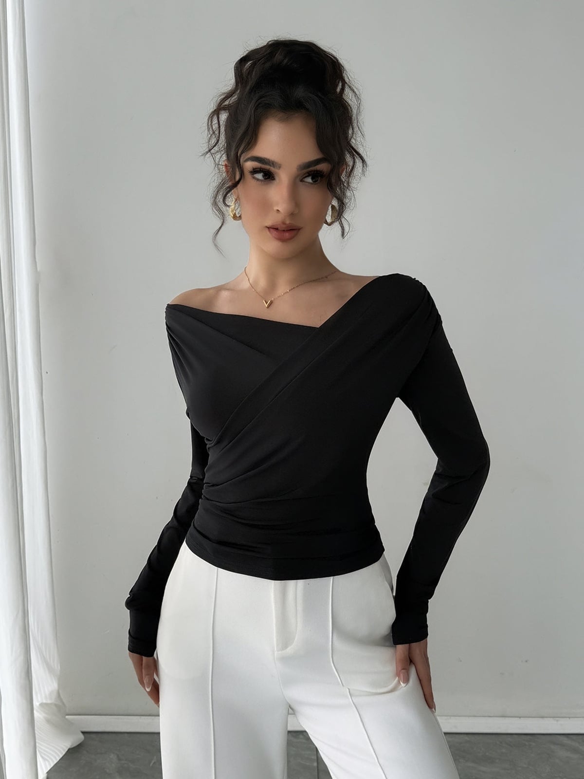 Black Off-Shoulder Wrap Top and White Wide-Leg Trousers — Business Dinner Outfits 2027