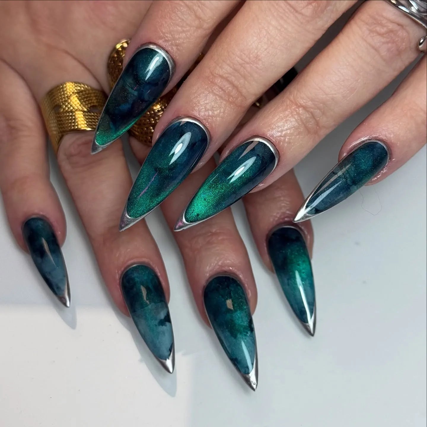 Long Stiletto Emerald Green Cat Eye Chrome French Tip Long Stiletto Emerald Green Cat Eye Chrome French Tip — Cat Eye Chrome Nails 2027