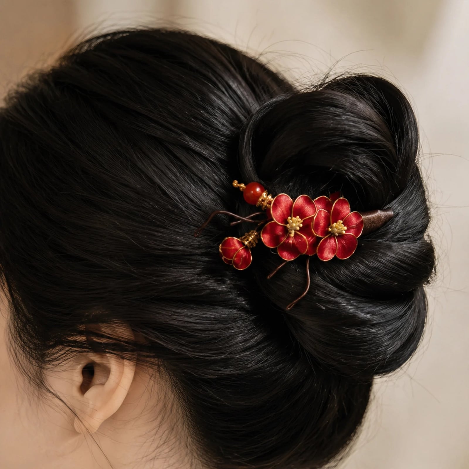 High Twisted Bun With Plum Blossom Accessory High Twisted Bun With Plum Blossom Accessory — Chinese Wedding Hairstyles 2027
