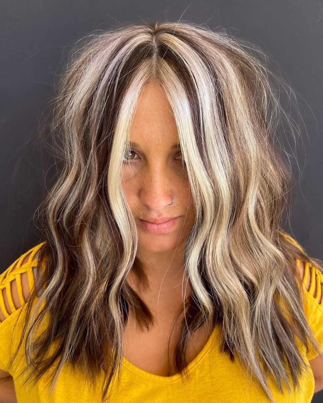 Collarbone Layers With Bold Blonde Face Framing — Chunky Blonde Highlights on Dark Hair 2027