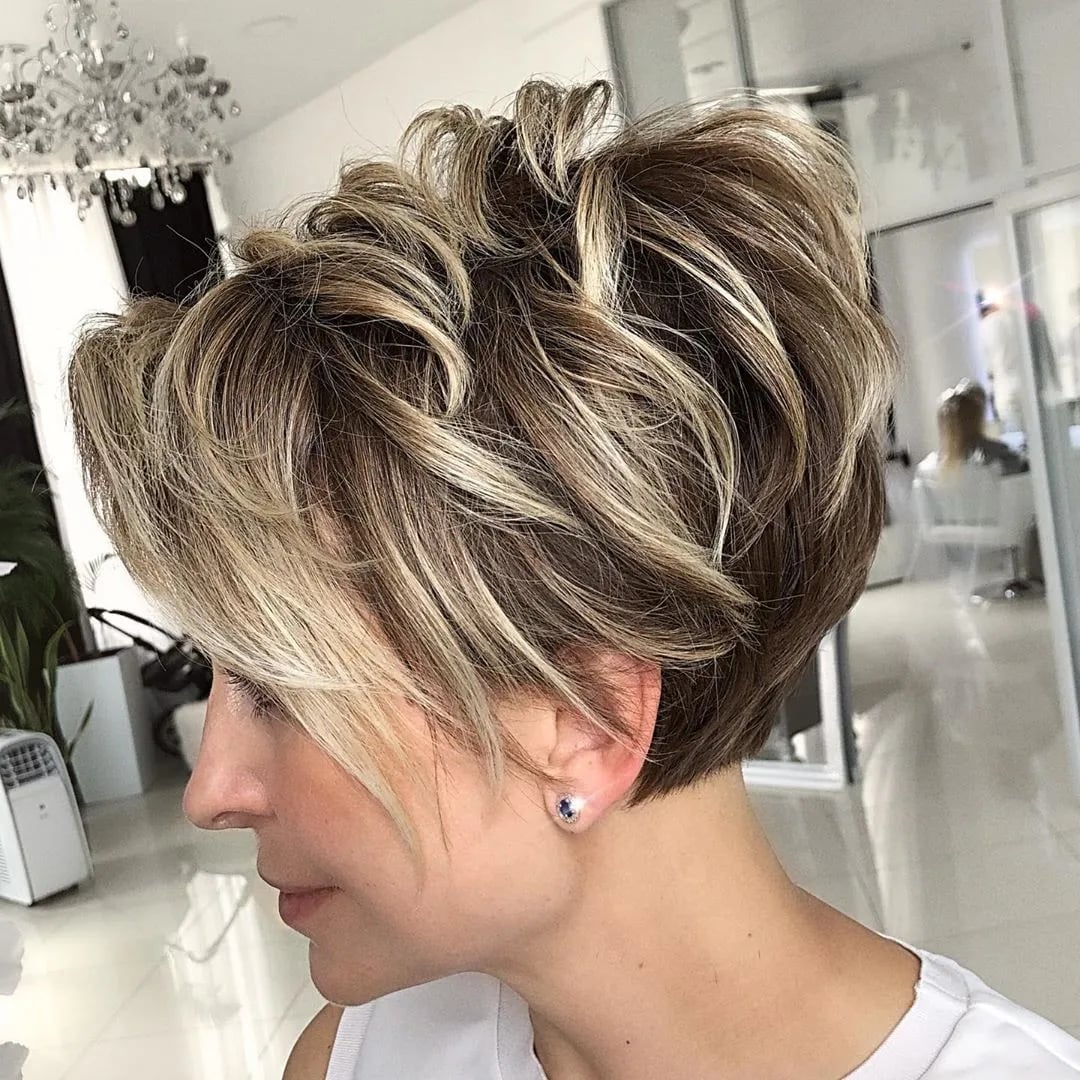 Pixie With Voluminous Side-Swept Bangs Pixie With Voluminous Side-Swept Bangs — Chunky Highlights Pixie 2027
