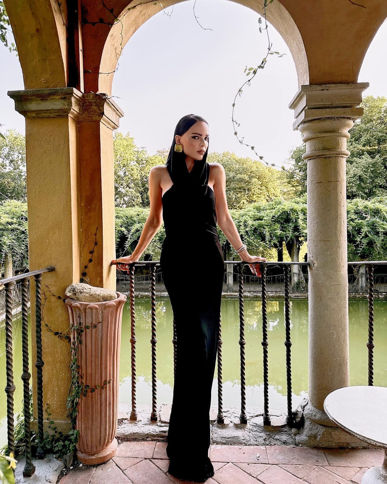 Black Halter Neck Gown With Column Silhouette Black Halter Neck Gown With Column Silhouette — Cocktail Attire Outfits 2027