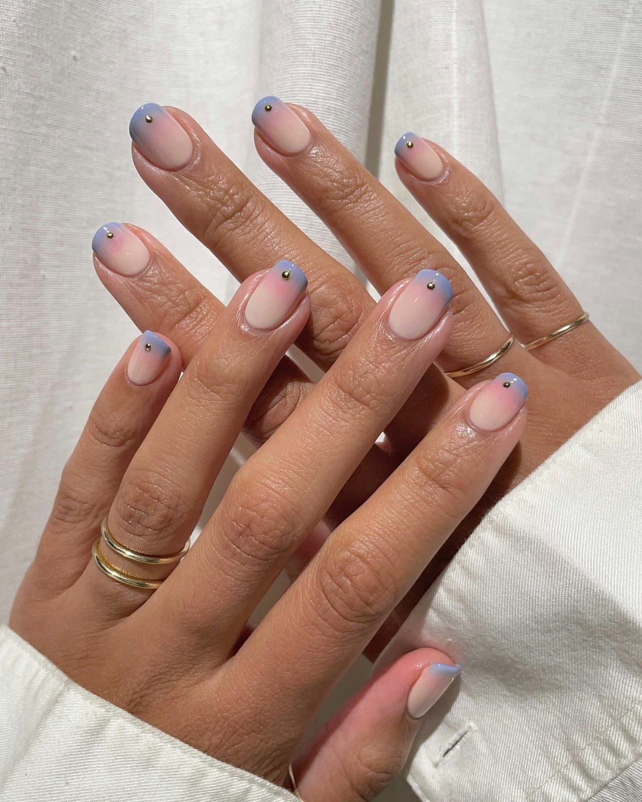Nude To Blue Gradient French Tip With Studs Nude To Blue Gradient French Tip With Studs — Cocktail Party Nails 2027