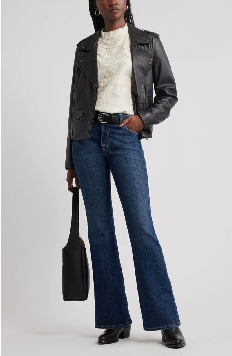 Dark wash bootcut jeans with a lace top and moto jacket — Concert Bootcut Jeans Outfits 2027