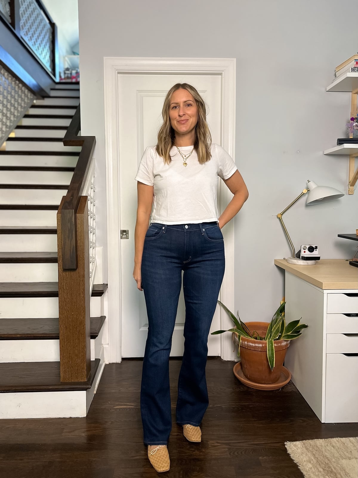 High rise dark wash bootcut jeans with a white cropped tee — Concert Bootcut Jeans Outfits 2027