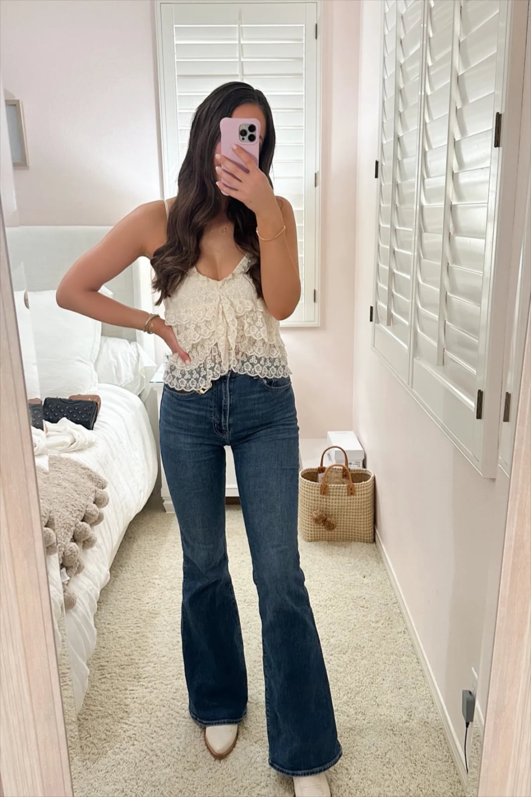 Extreme flare bootcut jeans with a cream lace camisole — Concert Bootcut Jeans Outfits 2027
