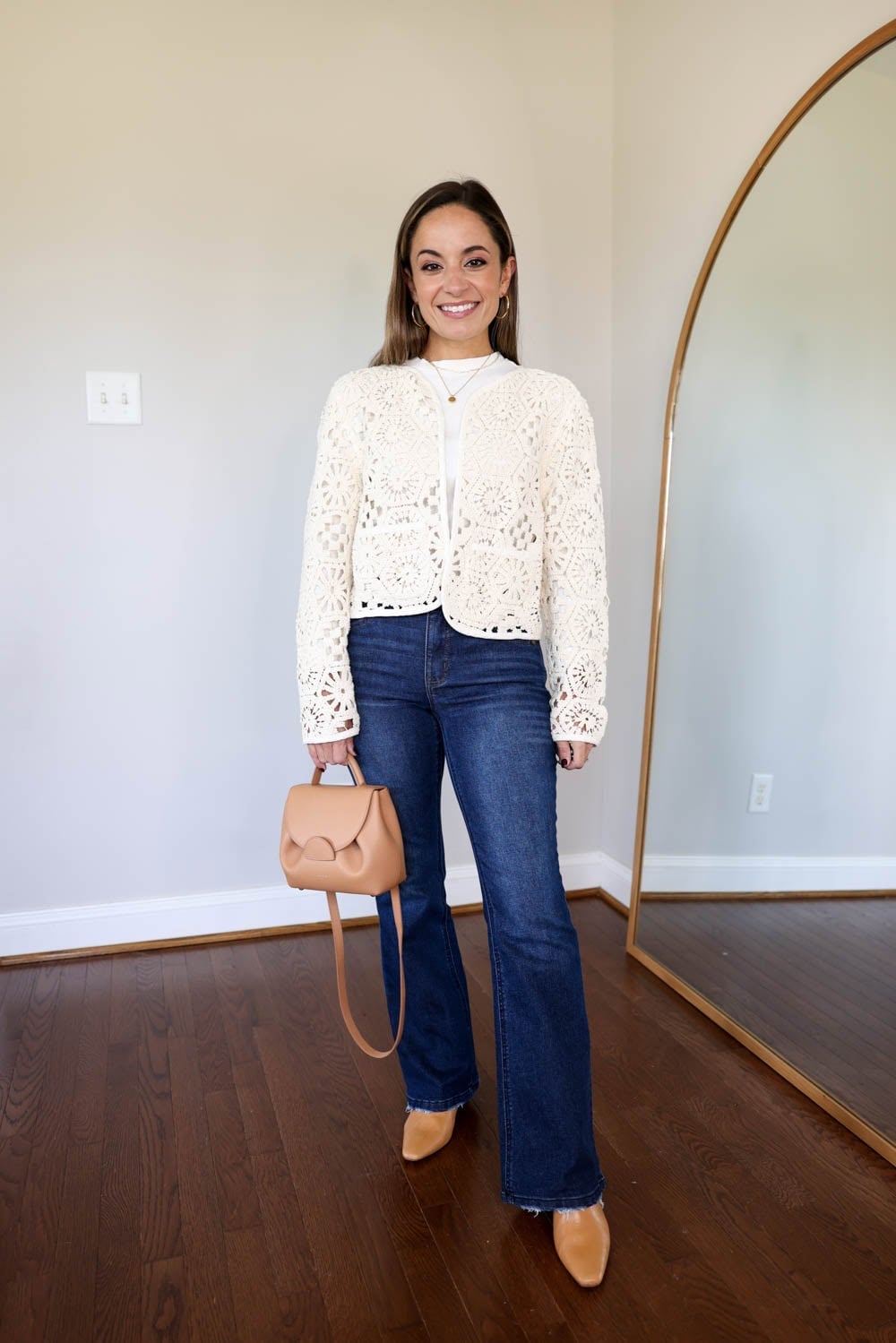 Dark wash flare jeans with a crochet jacket — Concert Bootcut Jeans Outfits 2027
