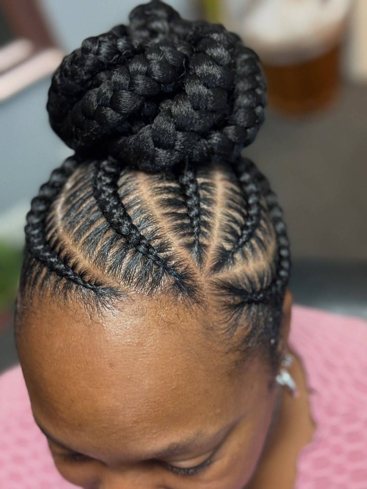 Voluminous Bun With Intricate Cornrows — Cornrow Bun 2027