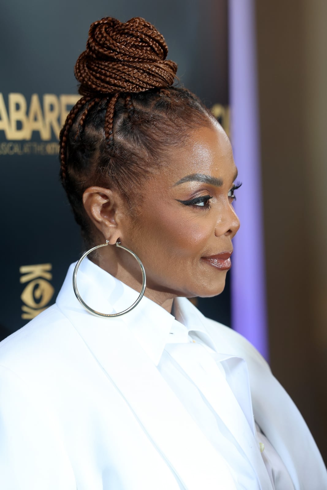 Brown Top Knot Bun With Cornrows — Cornrow Bun 2027