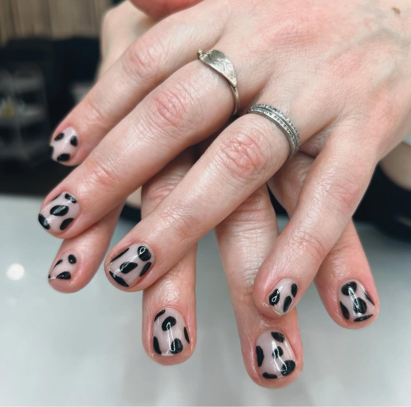 Scattered Black Cow Print Short Oval Nails Scattered Black Cow Print Short Oval Nails — Cow Print Airbrush Nails 2027