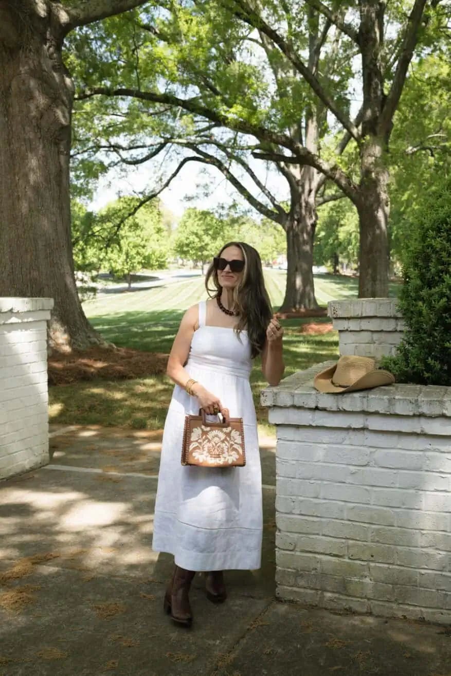 Brown cowboy boots with a white linen midi sundress Brown cowboy boots with a white linen midi sundress — Cowboy Boots Outfits 2027 with Sundress
