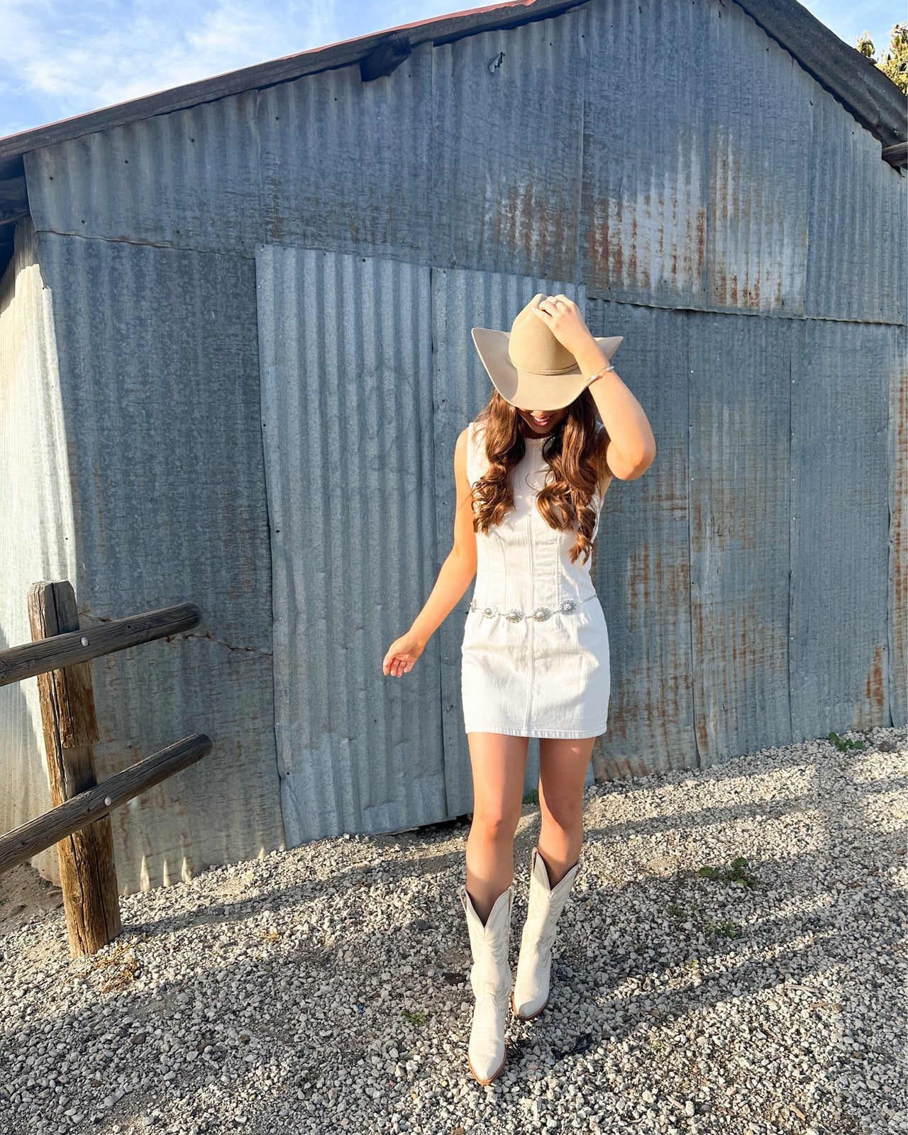 White cowboy boots with a white denim mini dress and silver belt White cowboy boots with a white denim mini dress and silver belt — Cowboy Boots Outfits 2027 with Sundress