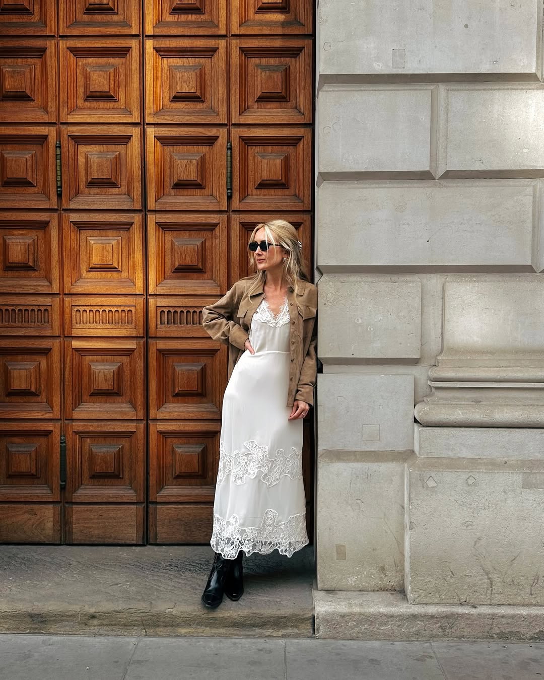 Black ankle cowboy boots with a white lace midi slip dress Black ankle cowboy boots with a white lace midi slip dress — Cowboy Boots Outfits 2027 with Sundress