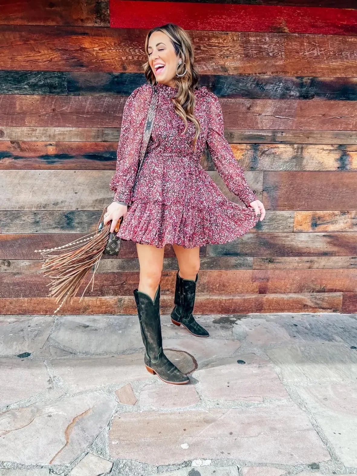 Black knee-high cowboy boots with a red floral print mini dress Black knee-high cowboy boots with a red floral print mini dress — Cowboy Boots Outfits 2027 with Sundress