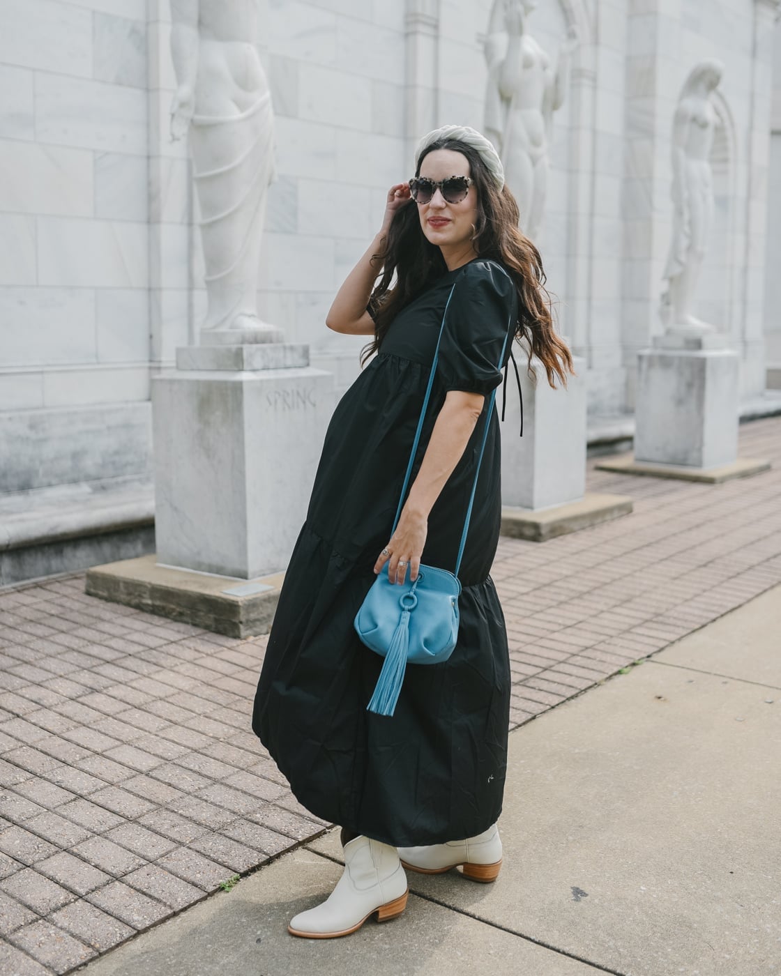 White cowboy boots with a black tiered sundress and blue bag White cowboy boots with a black tiered sundress and blue bag — Cowboy Boots Outfits 2027 with Sundress