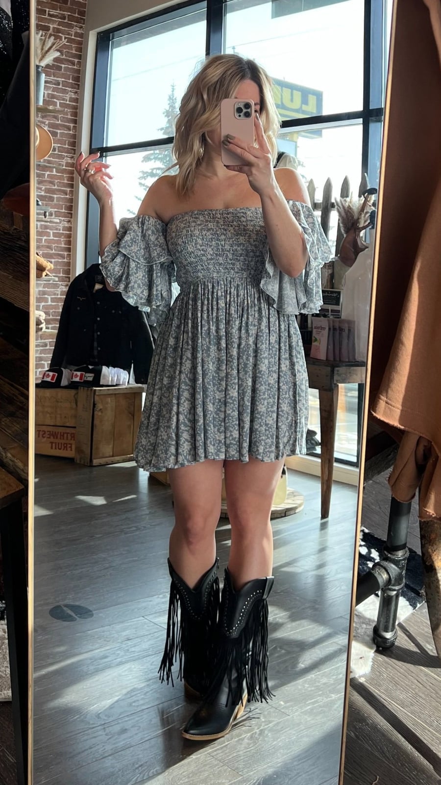 Black fringe cowboy boots with a floral smocked mini dress Black fringe cowboy boots with a floral smocked mini dress — Cowboy Boots Outfits 2027 with Sundress