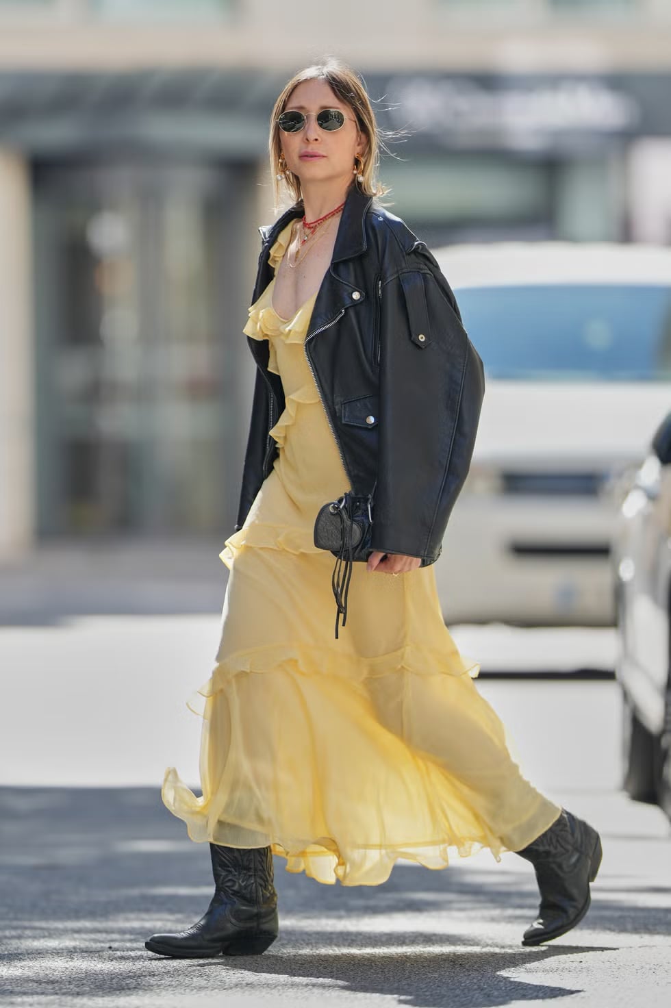 Black cowboy boots with a yellow ruffled maxi dress and leather jacket Black cowboy boots with a yellow ruffled maxi dress and leather jacket — Cowboy Boots Outfits 2027 with Sundress