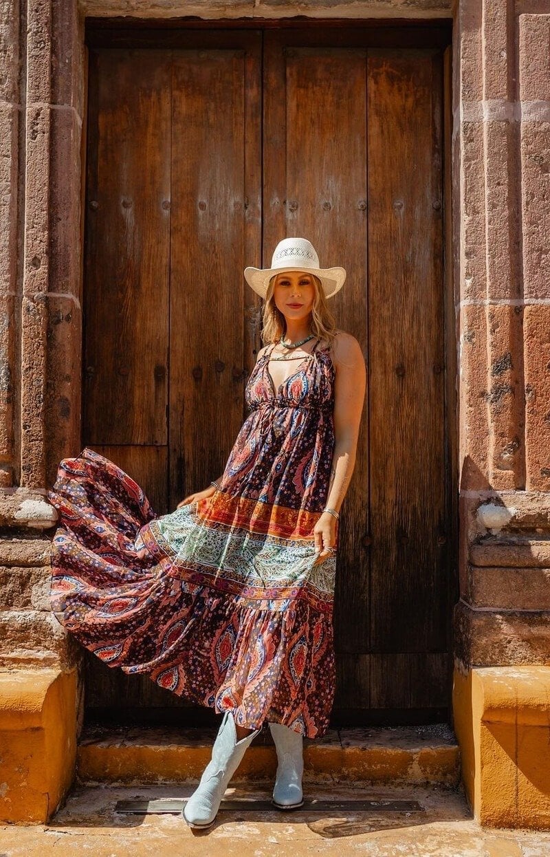 Light blue cowboy boots with a paisley tiered maxi dress Light blue cowboy boots with a paisley tiered maxi dress — Cowboy Boots Outfits 2027 with Sundress