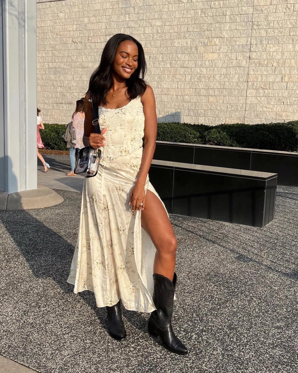 Black cowboy boots with a cream floral maxi dress and high slit Black cowboy boots with a cream floral maxi dress and high slit — Cowboy Boots Outfits 2027 with Sundress