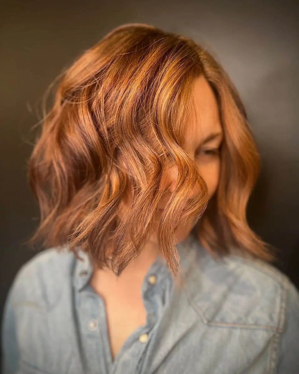 Collarbone Textured Waves Dimensional Cowboy Copper With Side Part Collarbone Textured Waves Dimensional Cowboy Copper With Side Part — Cowboy Copper Hair 2027