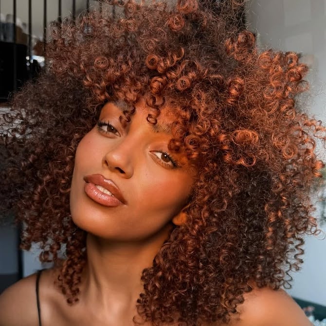 Short Curly Vivid Copper Afro With Fringe Short Curly Vivid Copper Afro With Fringe — Cowboy Copper Hair 2027